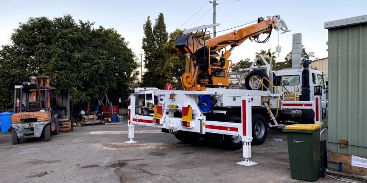 Parked Mobile Crane and Forklift — Diesel Mechanic in Yandina, QLD