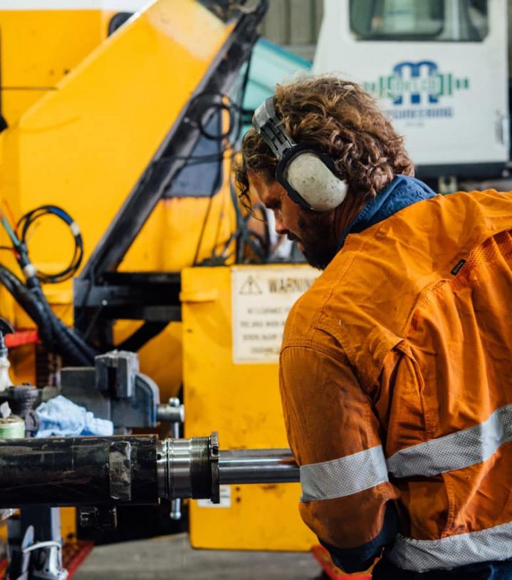 Mechanic Fixing Crane Hydraulic — Diesel Mechanic in Bundaberg, QLD